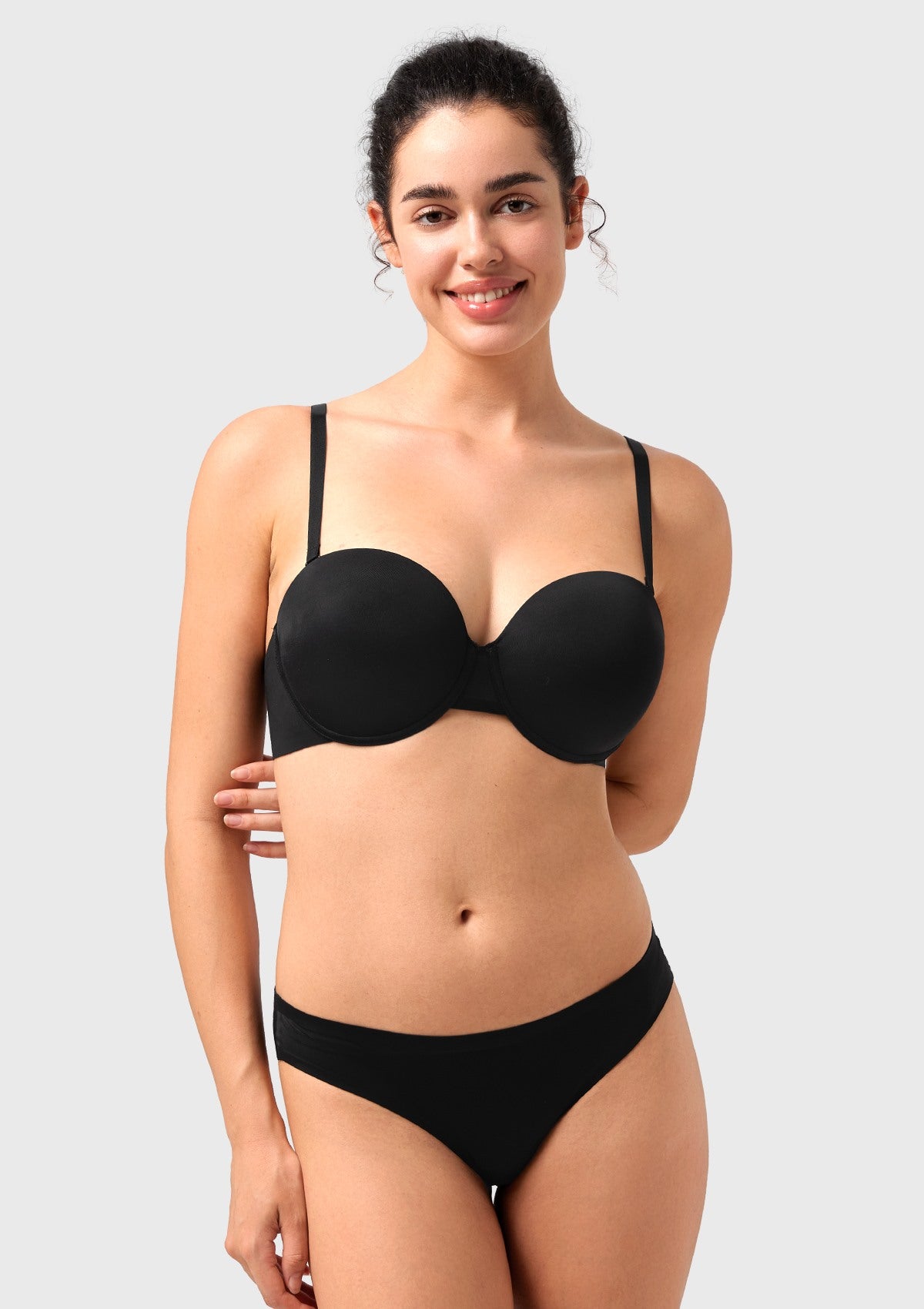 Front view of the black multiway underwire bra with traditional straps attached, offering comfortable and secure push-up support for daily wear.