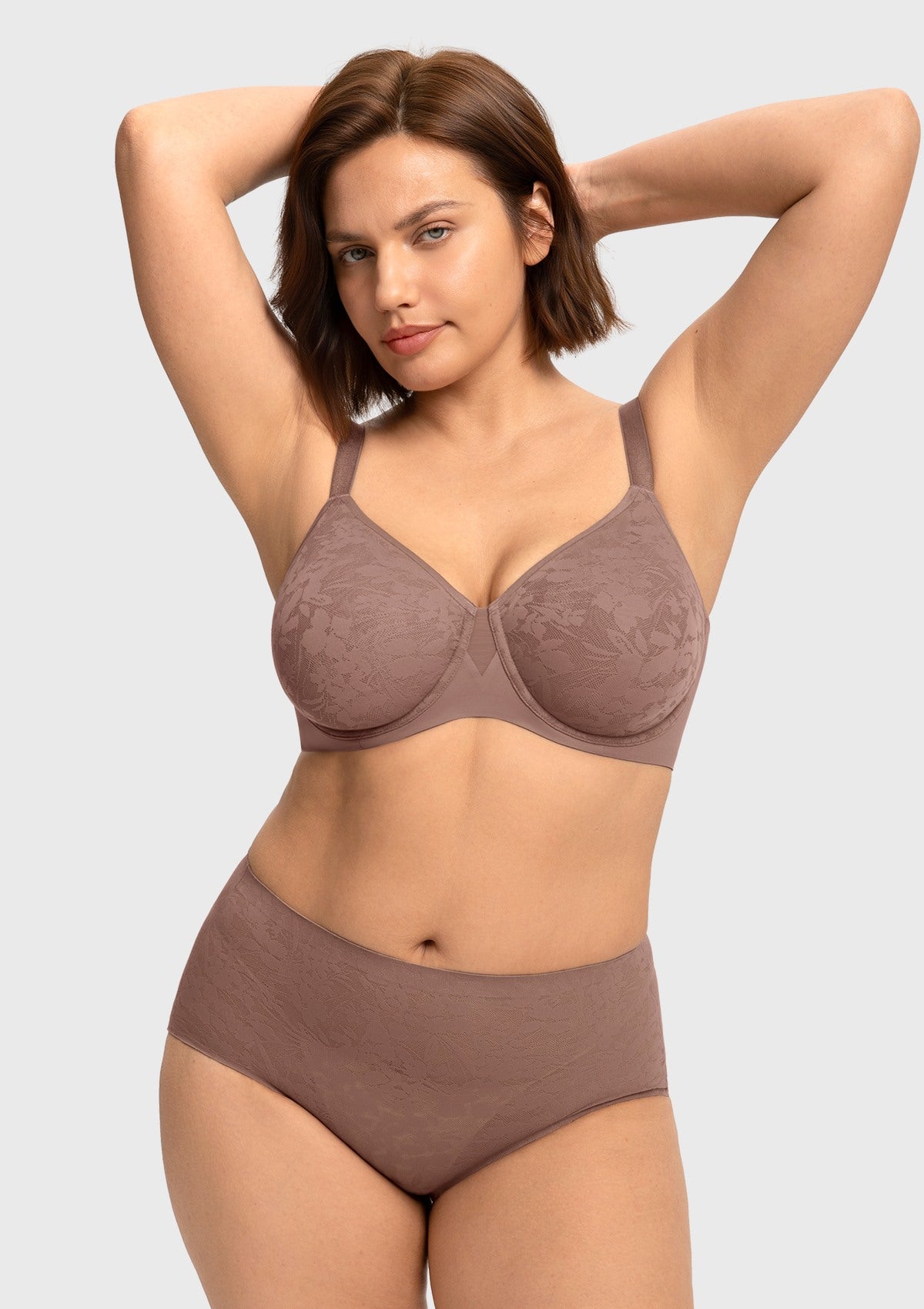Woman with arms raised wearing the dark brown purple full coverage underwire bra, enjoying lightweight support and breathable moisture-wicking comfort.