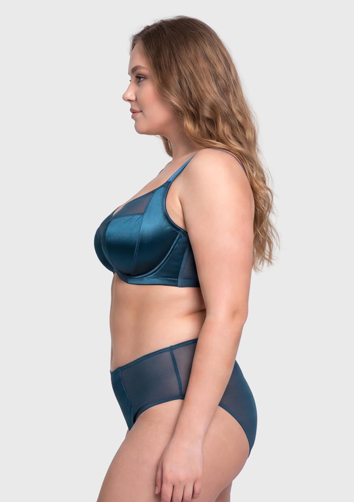 Side profile of the Ocean Blue Lunaire T-shape bra on model, showcasing the built-in side slings that eliminate side boob for big busted women.