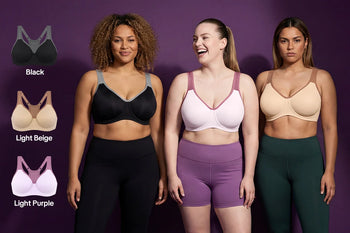 A woman confidently working out in the ComfyArc, the best sports bra for large breasts, featuring a breathable unlined design for ultimate bounce-free support.