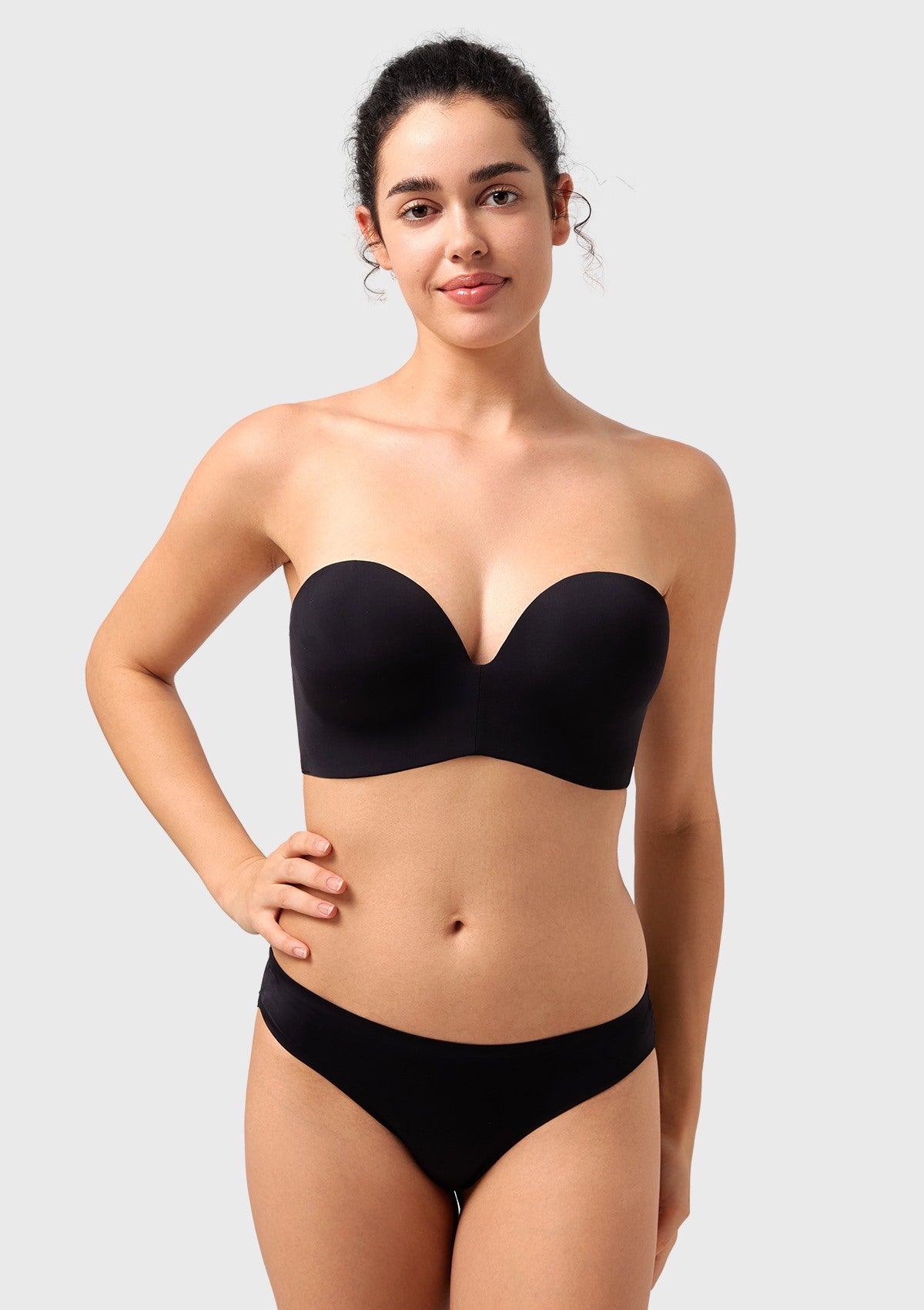 Front view of the black strapless bra, the perfect reliable bra for off the shoulder dress and elegant evening wear.