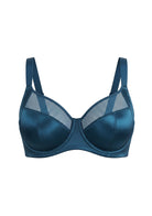 Studio flat lay of the Ocean Blue Lunaire shimmer bra, emphasizing the elevated center gore and luminous bottom cup fabric.