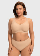 Front view of model in the Light Beige HSIA SoftTouch wireless bra, an invisible everyday foundation perfectly designed for a supportive everyday fit.