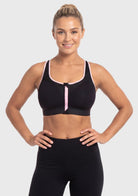 Front view of model in the classic Black HSIA Speed Race front closure sports bra, an effortless and supportive post surgery front zip bra for large busts.